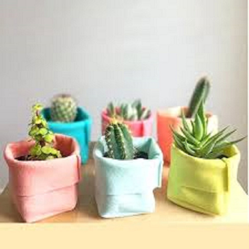 colorful felt plant pot on table